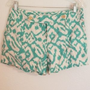 Cream and green shorts